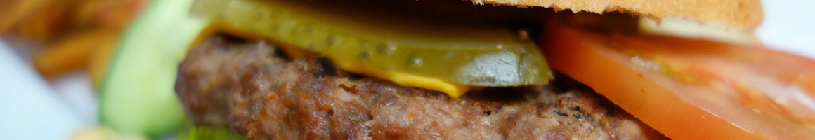 Eating American (Traditional) Burger at FlipSide Hudson restaurant in Hudson, OH.
